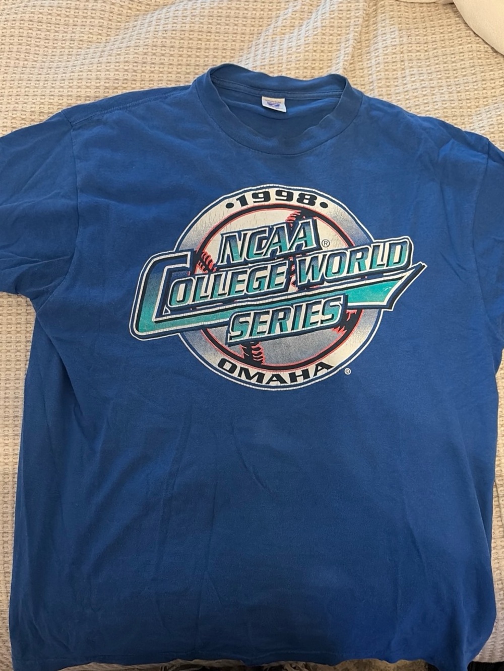 LOGO 7 Blue NCAA College World Series 1998 Graphic Tee
